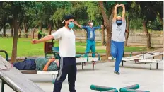  ?? Reuters ?? People exercise in a park in Lahore yesterday. Pakistan lifted its coronaviru­s lockdown on May 9.