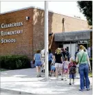  ?? FILE ?? Some parents of kids allegedly abused by John A. Hopkins, a former teacher at Clearcreek Elementary School, said they struggled to discuss the issue with their children.