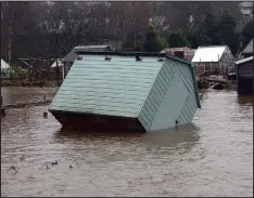  ??  ?? Swept away: Allotments after the River Tay burst its banks