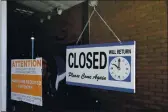  ?? MARCIO JOSE SANCHEZ — THE ASSOCIATED PRESS FILE ?? On July 18, a closed sign hangs in the window of a barbershop in Burbank.