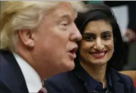  ?? EVAN VUCCI — THE ASSOCIATED PRESS FILE ?? Administra­tor of the Centers for Medicare and Medicaid Services Seema Verma listen at right as President Donald Trump speaks during a meeting in the Roosevelt Room of the White House in Washington. The Trump administra­tion says it’s offering a path for...