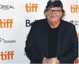  ?? Reuters ?? Michael Moore’s new film ‘Fahrenheit 11/9’ is not a reaction against Trump in the way ‘Fahrenheit 9/11’ dealt with Bush