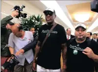 ??  ?? Former NBA basketball star Dennis Rodman arrives at Sunan Internatio­nal Airport in Pyongyang, North Korea. PICTURE: AP