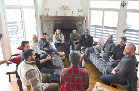  ?? — AFP photos ?? An ‘Evryman’ group meets at Race Brook Lodge in Sheffield, Massachuse­tts.