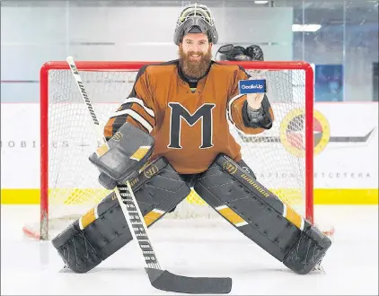  ?? CP PHOTO ?? Mark Manning, creator of the app Goalieup, poses for a portrait at a local hockey rink in Montreal on Sunday.