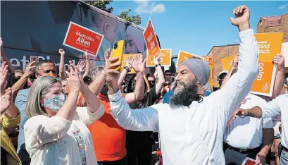  ?? PAUL CHIASSON THE CANADIAN PRESS ?? NDP Leader Jagmeet Singh is joined by Ontario NDP Leader Andrea Horwath, left, during a campaign stop in Hamilton on Tuesday.