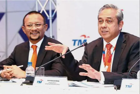  ??  ?? Challengin­g times: Bazlan’s (right) shocking departure as TM acting group CEO on Friday leaves Imri taking over as acting group CEO at a time when the telco’s services are coming under pressure from MCMC.