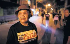  ??  ?? ABOVE
Maria Oqueria, 64, is one of the local women who decided to take to the streets in a challenge to shadowy local gunmen.