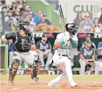  ?? ?? Uno de los momentos de acción en uno de los encuentros entre Licey versus Estrellas.