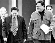  ?? By Jamie Humphrey, The Santa Fe New Mexican, via Reuters ?? In Santa Fe: New Mexico Gov. Bill Richardson, front right, shares a laugh with Han Song Ryol, North Korea’s deputy ambassador to the U.N., in January 2003.