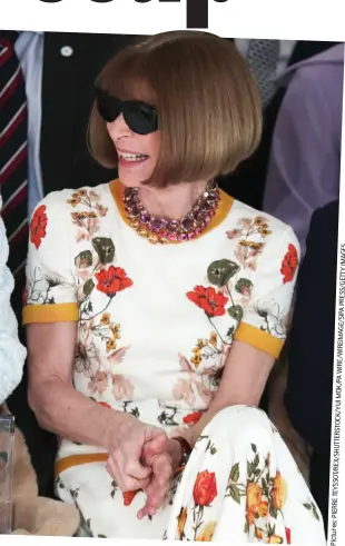  ??  ?? All smiles: Anna Wintour on the front row with the Queen
