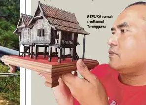  ??  ?? REPLIKA rumah tradisiona­l Terengganu.