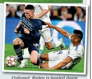  ?? ANDY HOOPER ?? Collared: Foden is hauled down by serial offender Casemiro