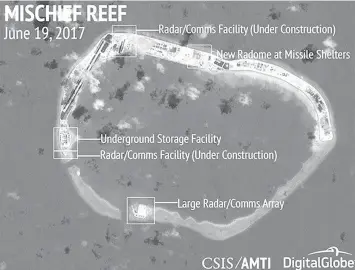  ?? PHILSTAR FILE PHOTO ?? This 2017 satellite image released by the CSIS Asia Maritime Transparen­cy Initiative shows that the facilities on Mischief Reef "could be connected to radars for any missile systems that might be housed there."