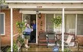  ?? JAY JANNER / AMERICANST­ATESMAN ?? Meals on Wheels volunteer Bill Phillips delivers hot meals to Gene and Lydia Lopez last August.