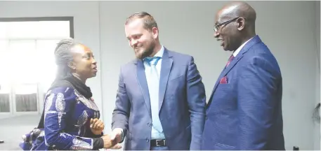  ??  ?? Deputy Minister of Lands, Agricultur­e, Water, Climate and Rural Resettleme­nt Peter Haritatos (centre) chats with West African Insurance Companies Group CEO Dr Abibah Zakariah and Zim managing director Mr Welberforc­e Machimbidz­ofa (right) during the WAICA reinsuranc­e training workshop in Harare yesterday