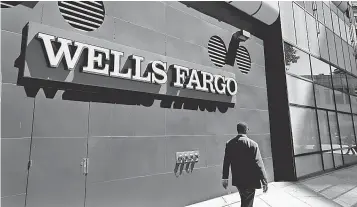  ?? 2014 PHOTO BY BEN MARGOT, AP ?? Wells Fargo says it has repaid $ 2.6 million to customers involved in the bank account scandal.