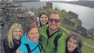  ??  ?? Texas woman Sheila Flanagan, right, with family members at Urquhart Castle on the shores of Loch Ness.