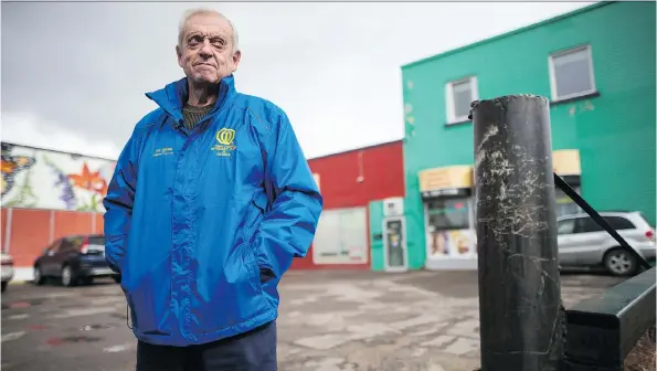  ?? BRANDON HARDER ?? Former Regina mayor Larry Schneider stands on Broad Street near where the Broadway Theatre once stood. Schneider says the street in the past used to be more vibrant.