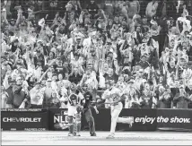  ?? ?? THE SAN DIEGO crowd, which was enthusiast­ic throughout the game, played a big role in the Padres’ 2-1 win in Game 3.