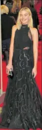  ??  ?? Actor Margot Robbie, nominated for Best Actress for I, Tonya wore an embellishe­d Givenchy gown