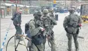  ?? REUTERS ?? Police officers guard the streets of central Stockholm after the attack.