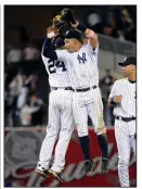  ?? (AP file photo) ?? Nick Swisher (right), Robinson Cano (left) and Melky Cabrera (not pictured) hit consecutiv­e home runs for the New York Yankees on this date in 2009 in an 11-4 victory over Baltimore.