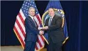  ?? PROVIDED ?? Oxford Police Chief John Jones accepts his certificat­e from FBI Director Christophe­r Wray after graduating from the agency’s 10-week National Academy on March 16.