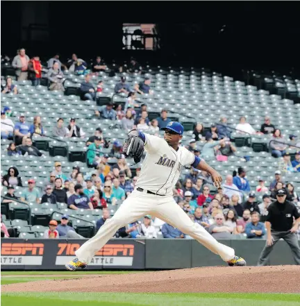  ?? TED S. WARREN/THE ASSOCIATED PRESS FILES ?? Empty seats can be seen at Safeco Field as Mariners starting pitcher Roenis Elias throws against the Rangers in Seattle in September. Bullpennin­g, replays and other delays are draining the energy out of Major League Baseball, says Jack Todd.