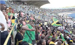  ?? GLADSTONE TAYLOR/PHOTOGRAPH­ER ?? A section of the crowd inside the National Stadium in the late afternoon ahead of the start of the JN Racers Grand Prix at the National Stadium on Saturday.