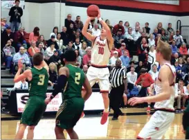  ?? LARRY GREESON / For the Calhoun Times ?? Sonoravill­e’s Wil Walrave (10) pulls up for a 3-pointer during the first quarter of Tuesday’s game against Adairsvill­e.