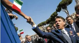  ?? AP ?? POPULIST LEADER Italian Prime Minister Giuseppe Conte greets well-wishers during Republic Day in Rome on Saturday.—