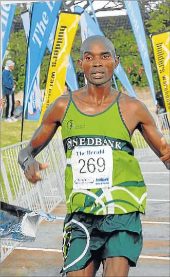  ?? Picture: SAM MAJELA. ?? STRIKING IT RICH: Sandile Ngunuza, seen here in a previous PE race, came ninth to win a gold medal at this year’s Comrades Marathon on Sunday. He is the first Port Elizabeth Comrades gold medallist