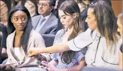  ??  ?? SISTERS: Olympians Simone Biles (l-r), McKayla Maroney and Aly Raisman arrive to testify at a Senate Judiciary hearing Wednesday on the FBI investigat­ion of disgraced Team USA doctor Larry Nassar (far left).