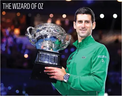  ?? Picture: EPA-EFE ?? Serbia’s Novak Djokovic with the Norman Brookes Challenge Cup trophy after beating Austria’s Dominic Thiem in the final of the Australian Open at Rod Laver Arena in Melbourne yesterday. See Backpage