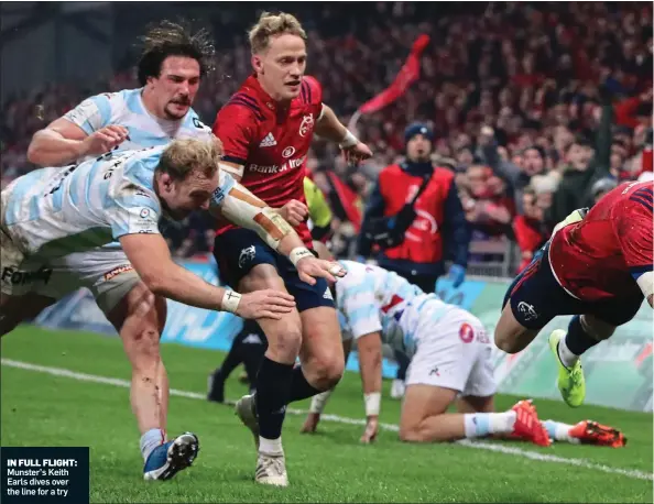  ??  ?? IN FULL FLIGHT: Munster’s Keith Earls dives over the line for a try