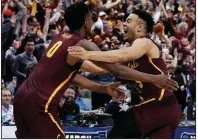  ?? AP/TONY GUTIERREZ ?? Loyola-Chicago guards Donte Ingram (left) and Marques Townes celebrate after Ingram’s last-second three-pointer gave the Ramblers a 64-62 victory over the Miami Hurricanes on Thursday in the South Region of the NCAA Tournament in Dallas.