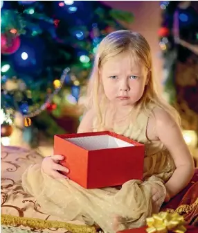  ??  ?? Children like to open something on Christmas Day – but if you’re wise with your gifting, you can give them a present that brings many happy returns too.