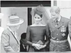  ?? CHRIS JACKSON/GETTY IMAGES ?? Queen Elizabeth and the newlyweds gathered to honor the Royal Air Force.