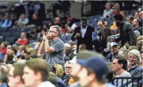  ??  ?? A fan yells out during a game versus the Chicago Bulls at the Fedexforum earlier this season.