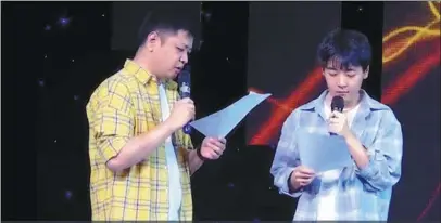  ??  ?? Xie Tiantian (left), initiator of Voice Bear Studio, performs with another voice actor, nicknamed Fengxiu, during an animation exposition event held in Wuhan in May.