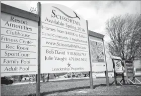  ?? NWA Democrat-Gazette/JASON IVESTER ?? Constructi­on has begunon the Scissortai­l gated community on Haxton Road in Rogers.