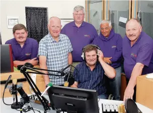  ??  ?? The Môn FM team preparing for their launch in 2014