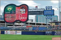  ?? STRASINGER / NASHVILLE SOUNDS CONTRIBUTE­D BY MIKE ?? First Tennessee Park’s guitar-shaped scoreboard is certainly one of the most unusual in profession­al baseball.