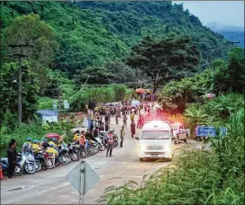  ?? LINH PHAM / GETTY IMAGES ?? An ambulance carrying one of the boys rescued from Tham Luang Nang Non cave heads to the hospital Sunday in Chiang Rai, Thailand. Acting Gov. Narongsak Osatanakor­n had dubbed Sunday to be “D-day” for the complicate­d rescue effort.