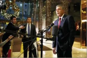  ?? EVAN VUCCI — THE ASSOCIATED PRESS ?? In this file photo, Rep. Lou Barletta, R-Pa., right, talks with reporters after a meeting with then President-elect Donald Trump at Trump Tower in New York.