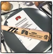  ??  ?? Table settings had a baseball theme at the BP28 Gala, which raised $700K to fight pediatric cancer.