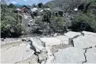  ?? Picture: ADEK BERRY/AFP ?? WIDESPREAD DAMAGE: Cracked concrete and damaged houses are pictured in Pemenang in northern Lombok