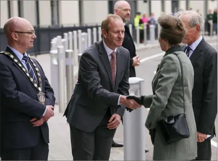  ?? ?? Norman Coalter, High Sheriff for County Fermanagh, welcomes Princess Anne to Enniskille­n, as Council Chair, Councillor Thomas O’reilly (Sinn Féin) looks on, with Viscount Brookeboro­ugh flanking Her Majesty, right.