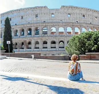  ??  ?? Left, Visiting Rome’s deserted tourist attraction­s has been a once-in-a-lifetime experience for the au pair Emily HutchingGo­ugh.